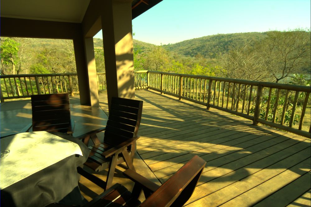 Self Catering Chalets - Gardens rich in Bird-life overlooking Hazyview Kiepersol Conservancy